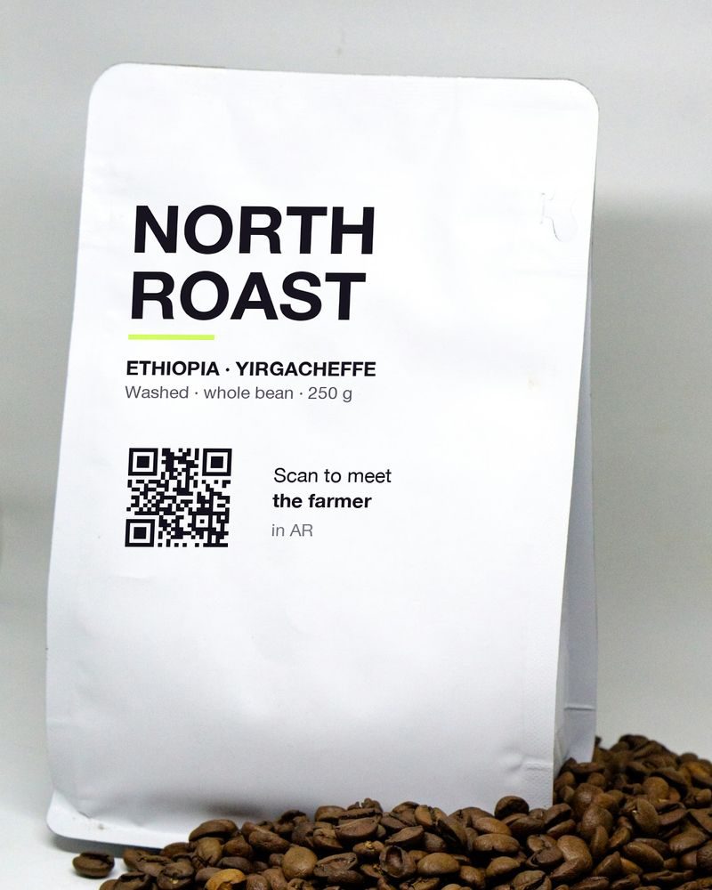 A coffee bag with a QR code printed on its label